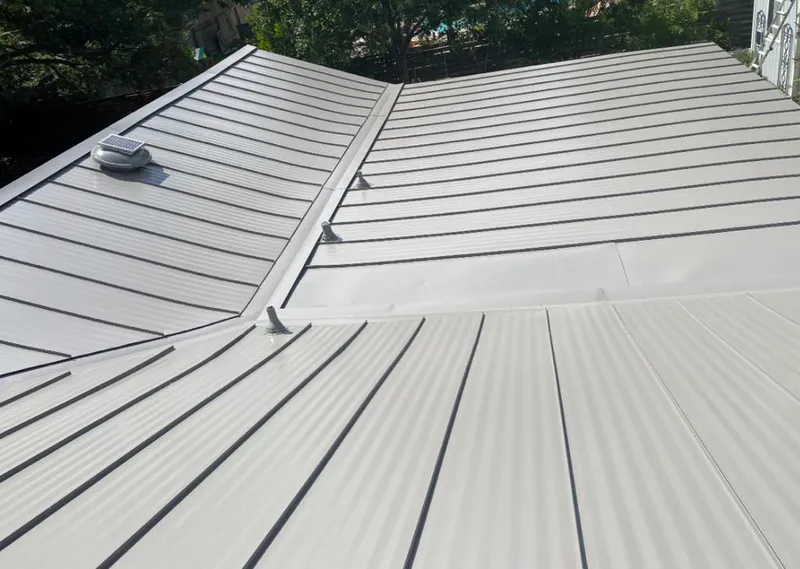 Solar attic fan installed on a metal roof for Roof Ventilation in Santa Rosa
